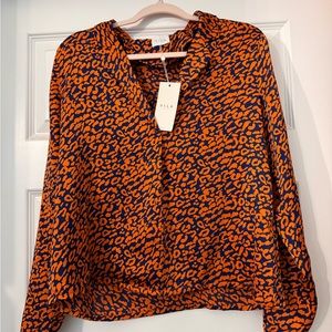 Orange and blue blouse